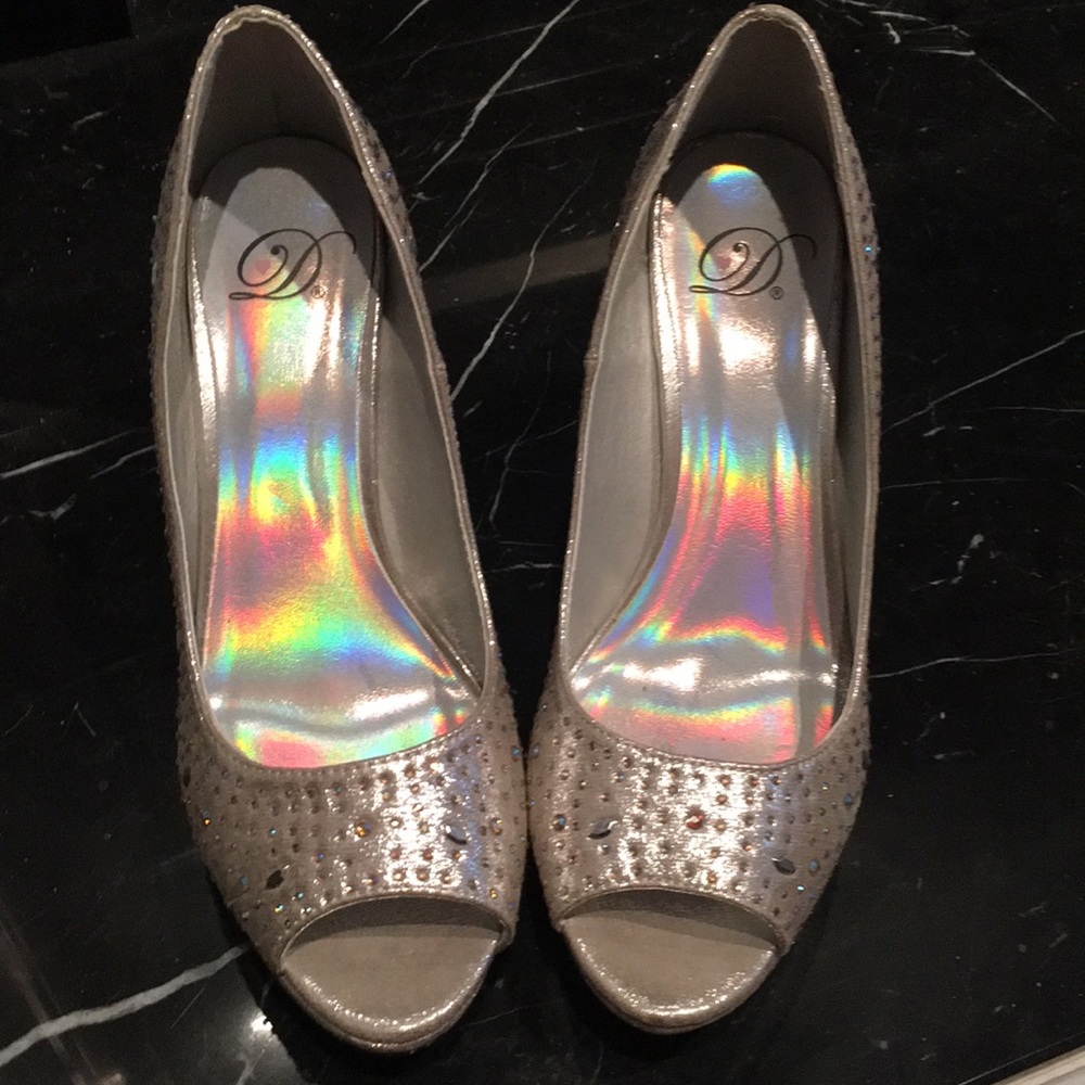 Women's silver sparkly studded dress shoes.